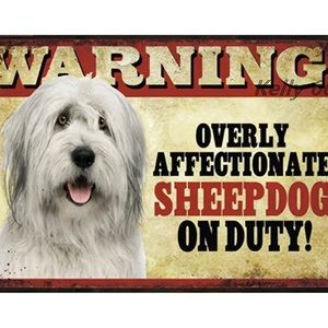 Overly Affectionate Sheepdog on Duty Sign